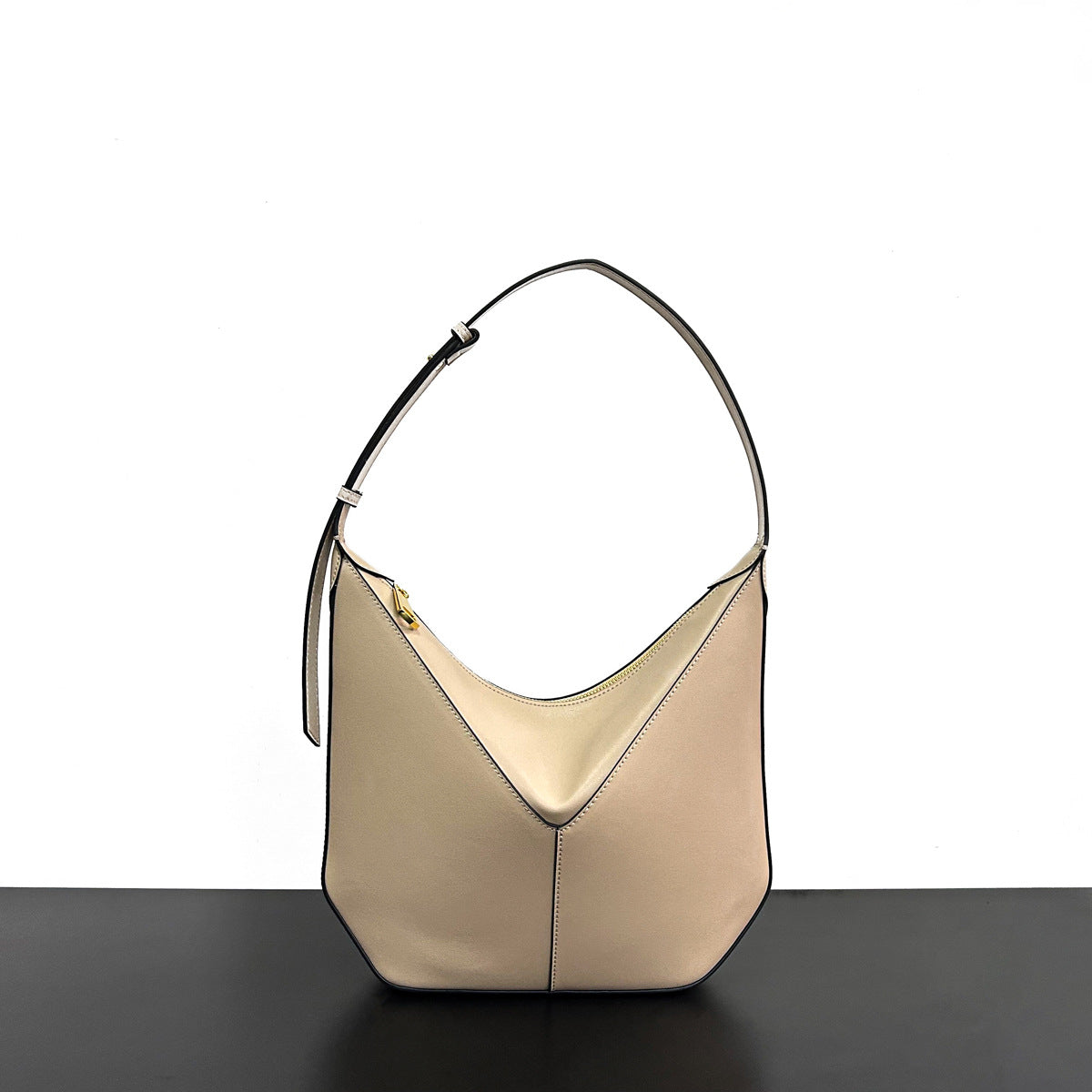 2024新款小牛皮高级感小众设计黑边手提单肩斜挎腋下包真皮吊床包