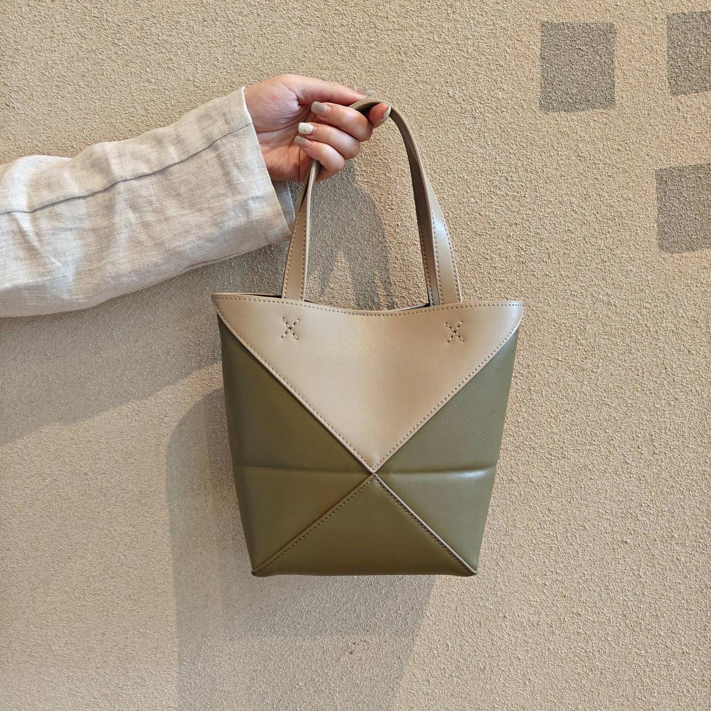 2024新款真皮女包变形几何拼接折叠托特单肩斜跨潮流双肩厂家