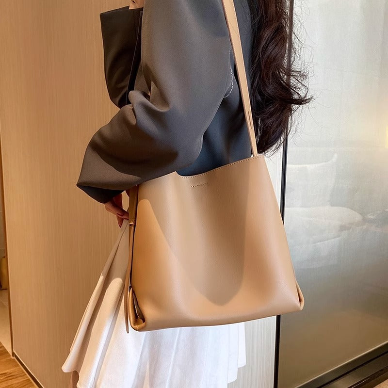 真皮水桶包女2023新款小众设计通勤女包单肩斜跨包时尚百搭托特包