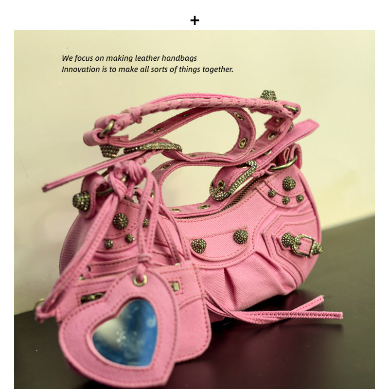 真皮包包女2022新款单肩轻奢月牙包质感法式腋下铆钉流苏褶斜挎