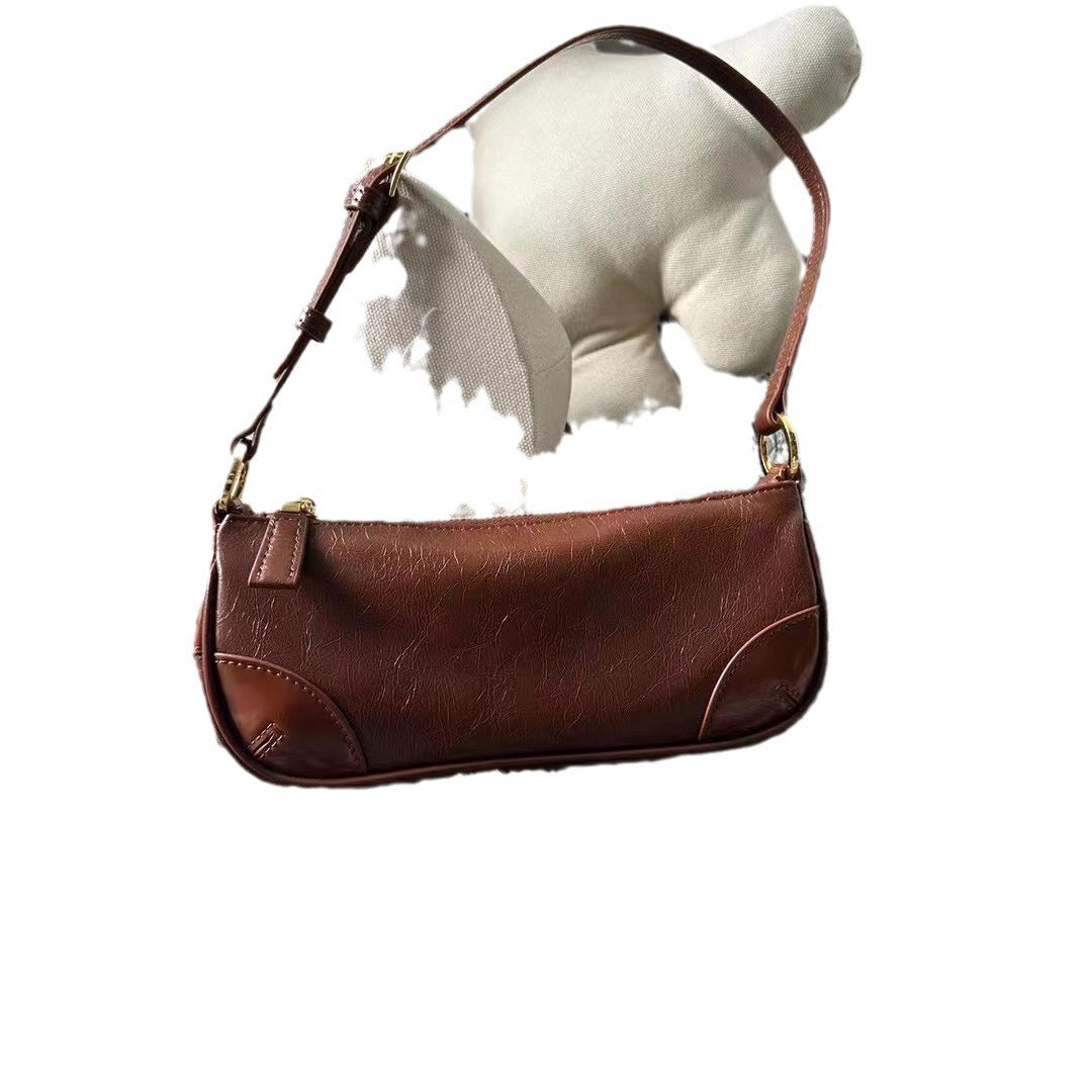 早春牛皮女包2024新款时尚潮流个性百搭单肩斜挎小包包潮真皮女包