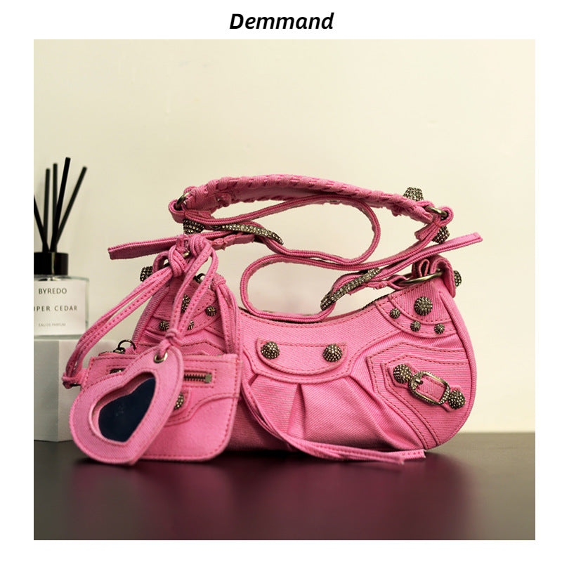 真皮包包女2022新款单肩轻奢月牙包质感法式腋下铆钉流苏褶斜挎