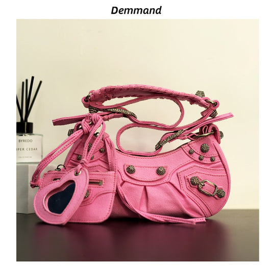 真皮包包女2022新款单肩轻奢月牙包质感法式腋下铆钉流苏褶斜挎