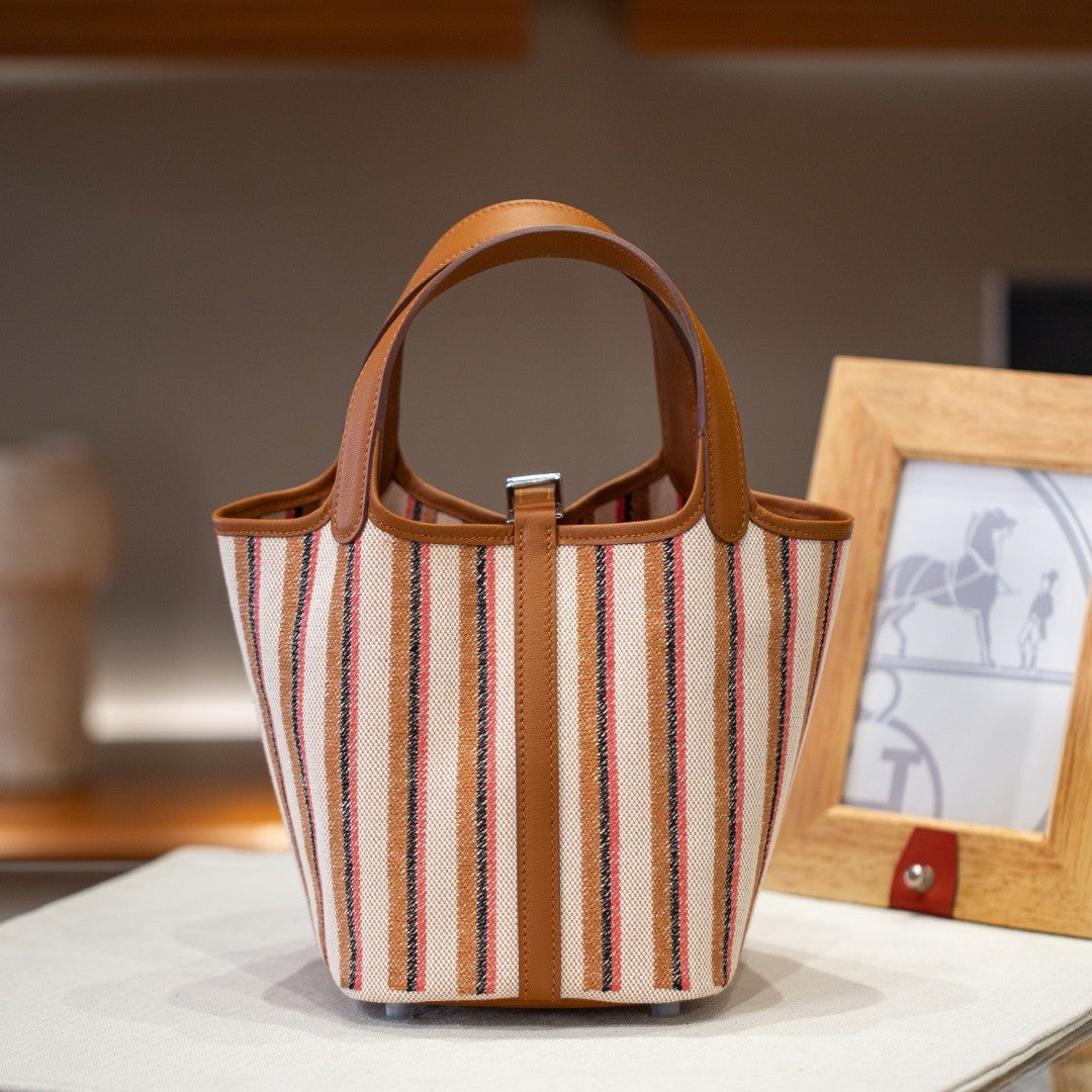 2025夏新款帆布配皮菜篮子大容量手提包通勤百搭真皮女包工厂批发