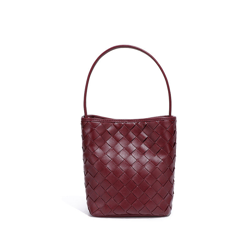 潮流新品手工编织手提女包小巧轻便单肩斜挎包质感纯色迷你水桶包