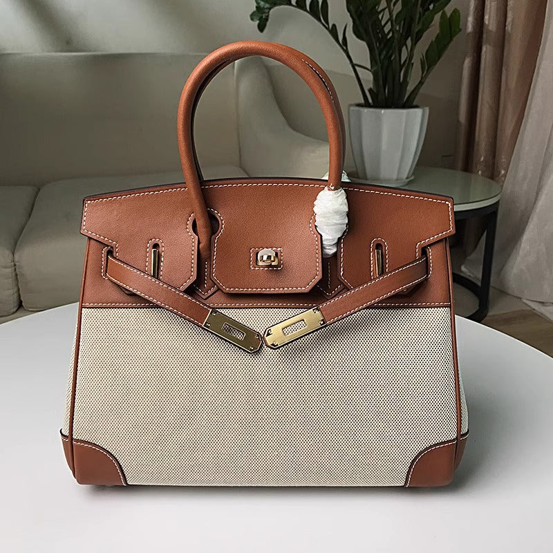 高品质时尚简约铂金包帆布拼接swift牛皮女包休闲桶包手提单肩包