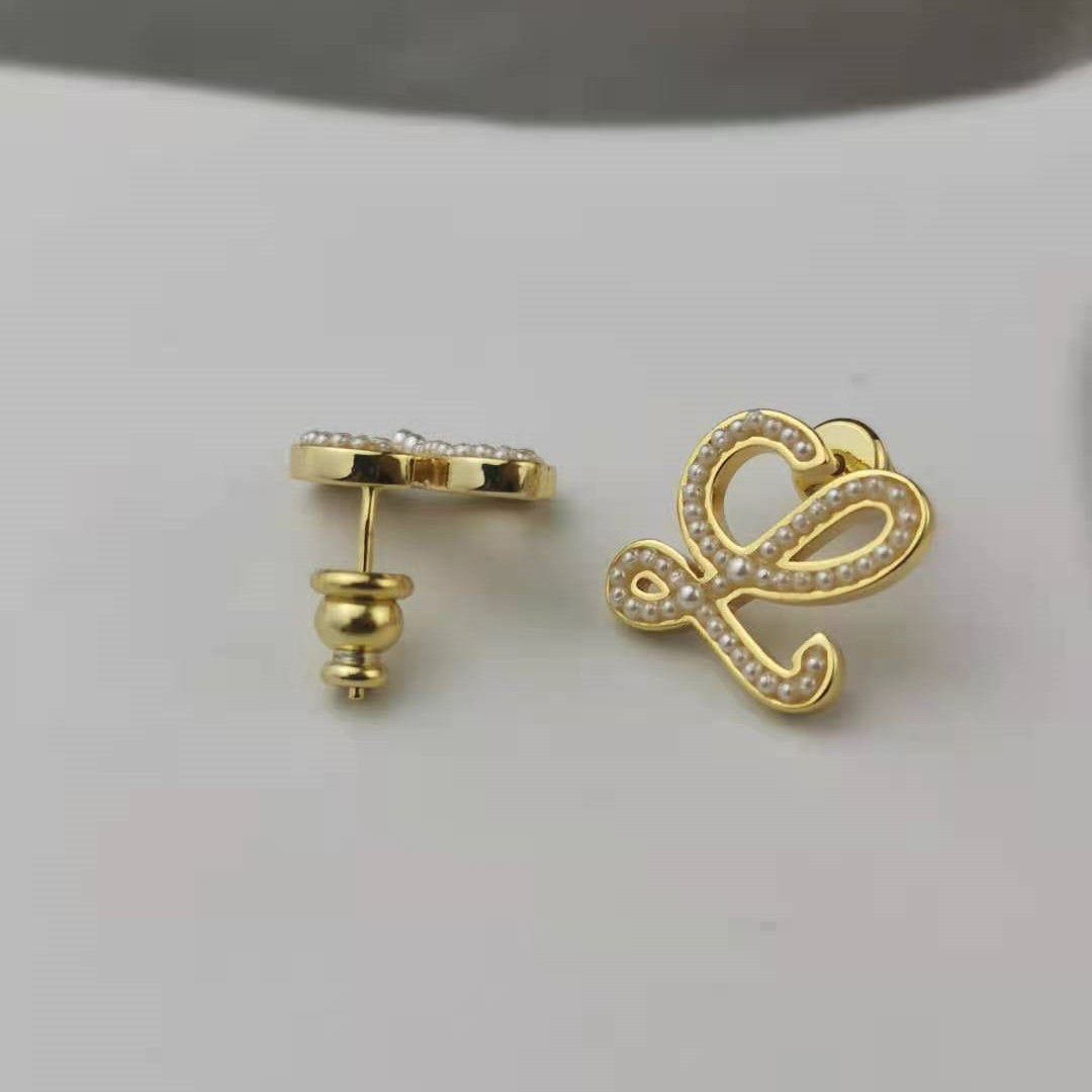 罗家新款几何抽象珍珠耳钉高级感时尚气质厂家批发高版小米珠耳环