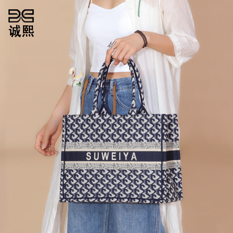 包包2025新款潮大容量托特包单肩手提购物袋时尚针织提花刺绣女包