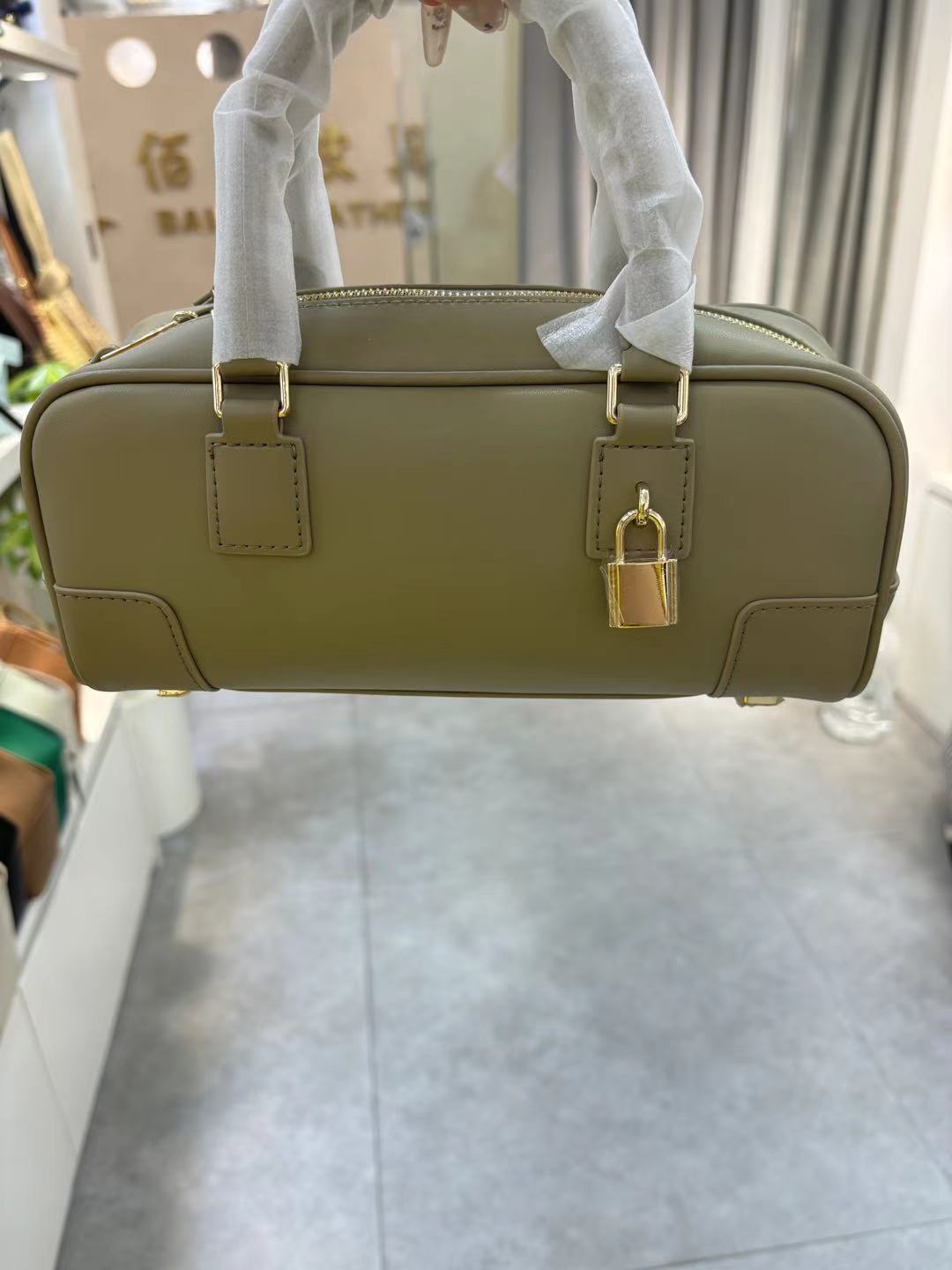 婉云质感真皮2025新款单肩斜挎包迷你复古手提保龄球包小众设计