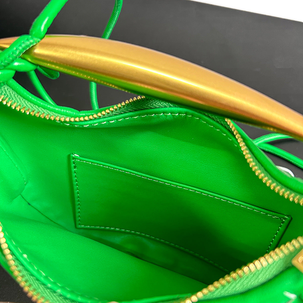 拉链款编织包包2023新款牛皮金属手柄月牙包单肩斜挎手提包时尚