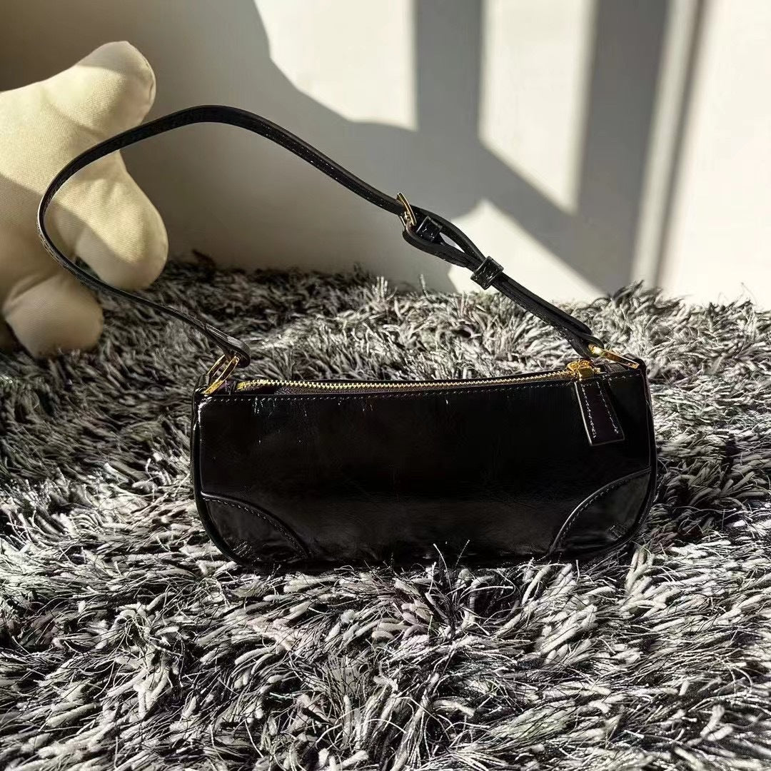 早春牛皮女包2024新款时尚潮流个性百搭单肩斜挎小包包潮真皮女包