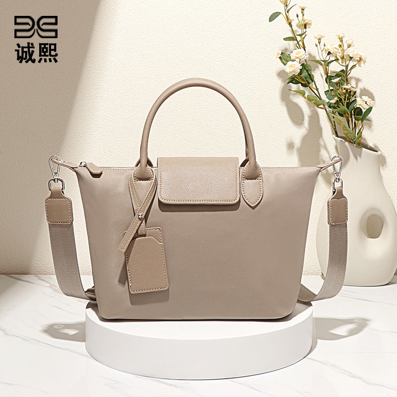 时尚新款大容量龙襄饺子包单肩斜挎包休闲潮流质感女包通勤手提包