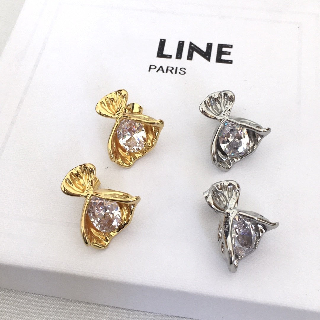 赛家新款手捧花耳钉女高级感个性气质锆石CEL风黄铜镀金耳环批发