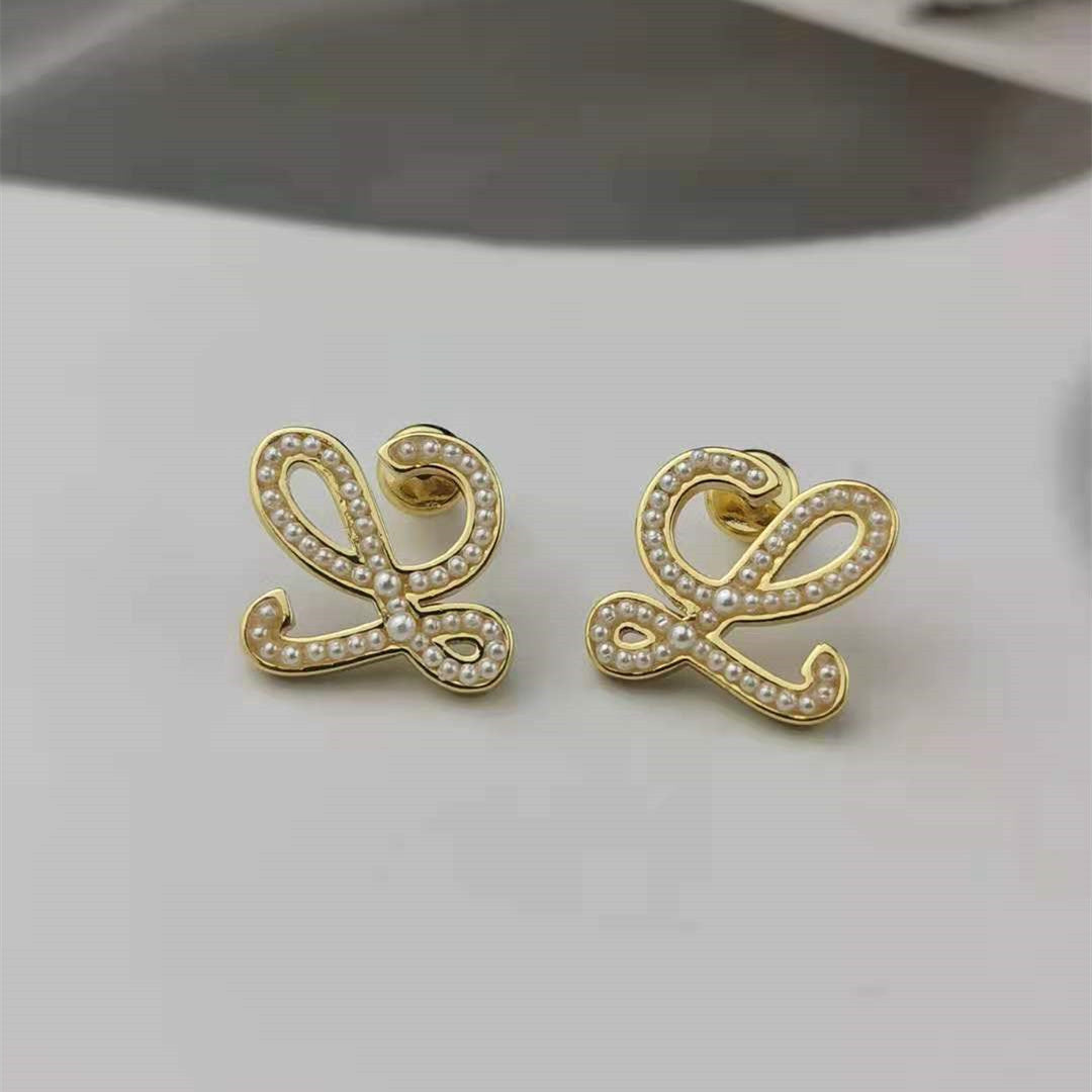 罗家新款几何抽象珍珠耳钉高级感时尚气质厂家批发高版小米珠耳环