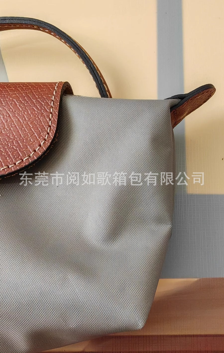 法国夏季新款mini尼龙饺子包单肩斜挎包迷你化妆包百搭手提手机包