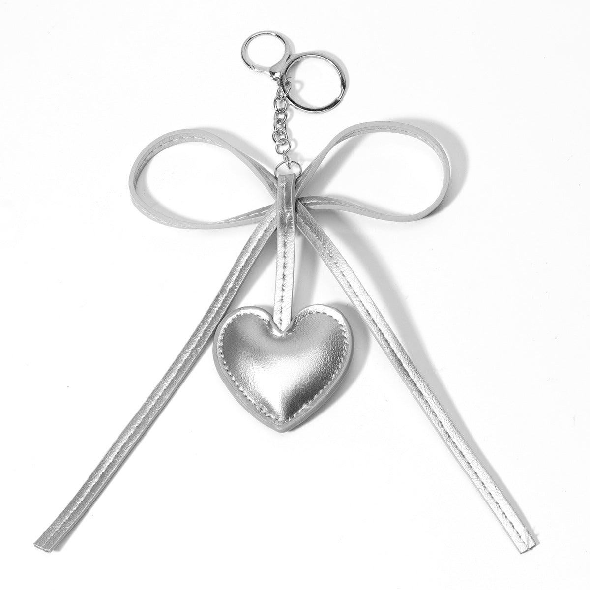 工厂批发定制时尚热销牛角包扣仿真皮挂饰挂件钥匙扣装饰品包包挂