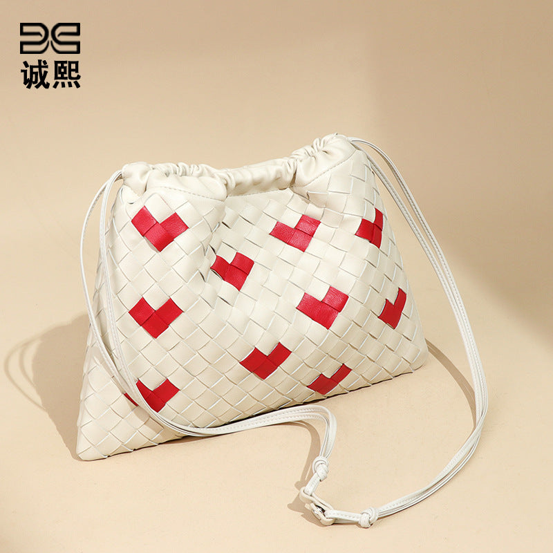 小众手工编织女包2025新款爱心福袋云朵包束口垃圾袋单肩斜跨包包