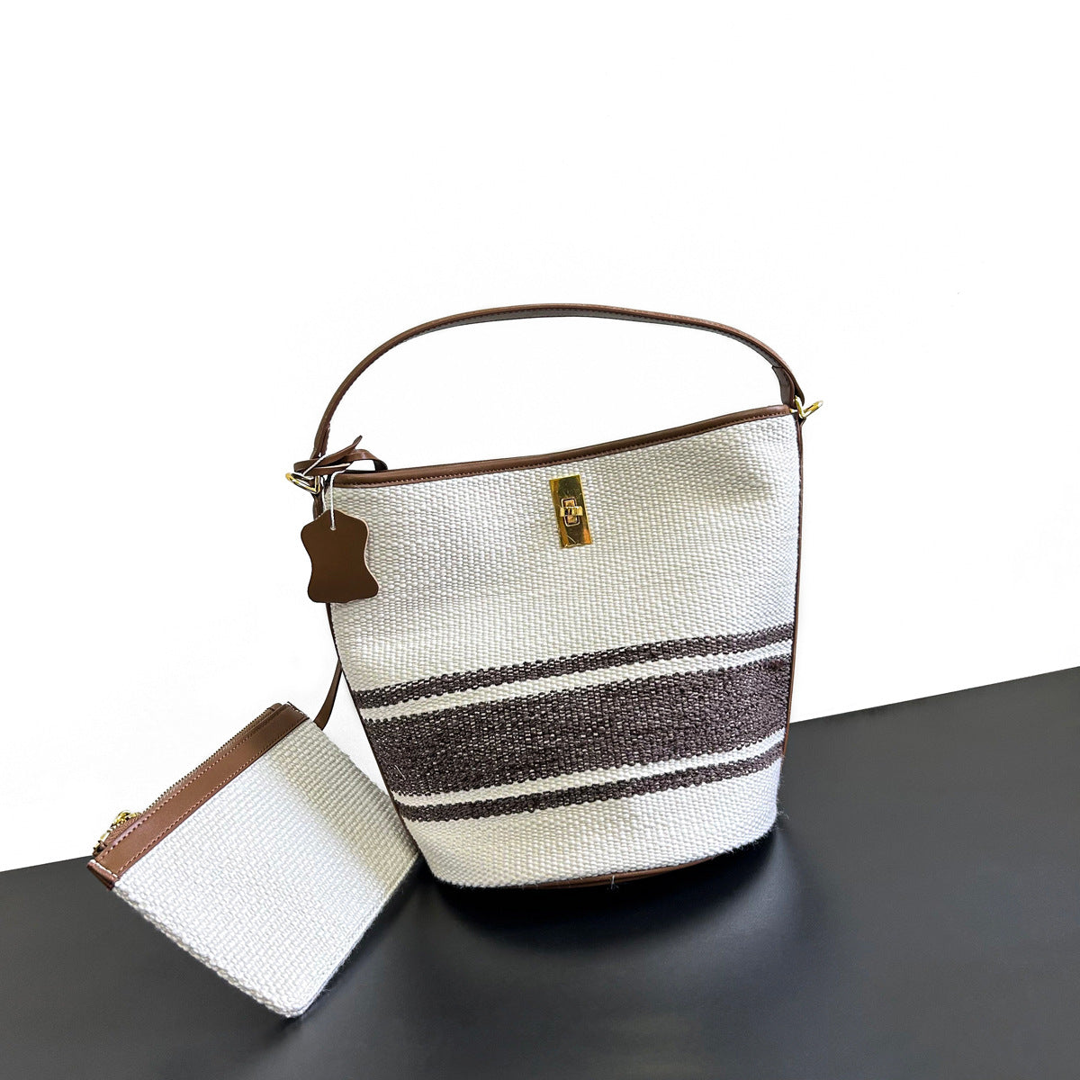 夏季帆布包包女2022新款今年流行托特包上班手工编织大容量水桶包