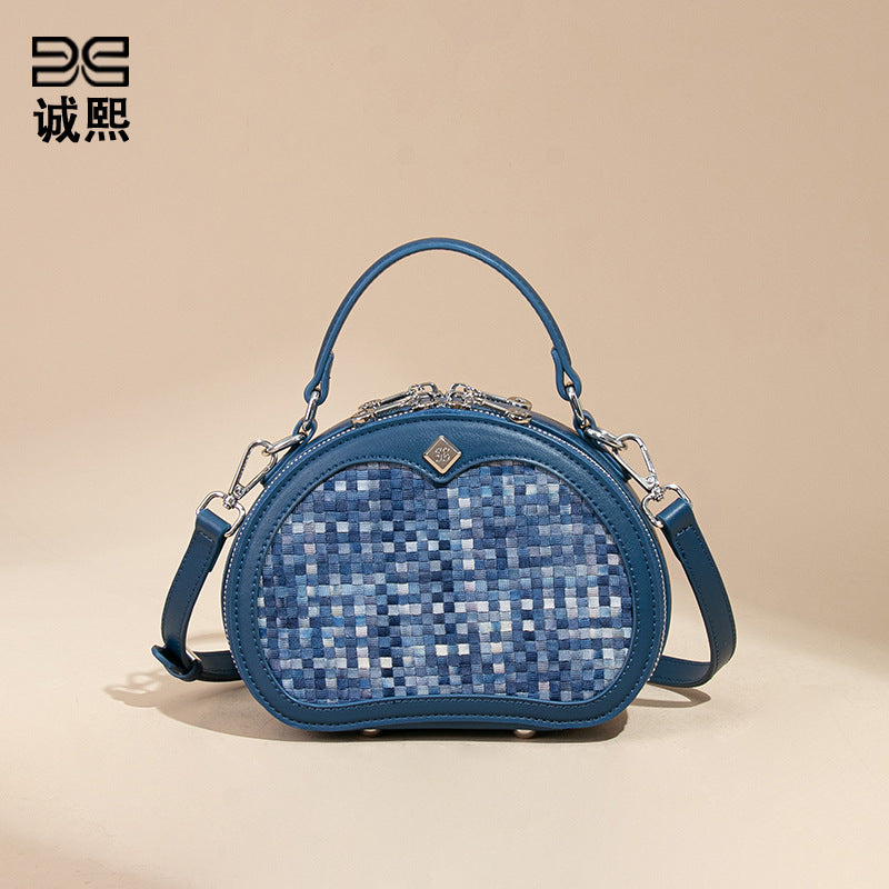 时尚韩版2025新款手拎小圆包小众设计百搭单肩斜跨包休闲编织女包