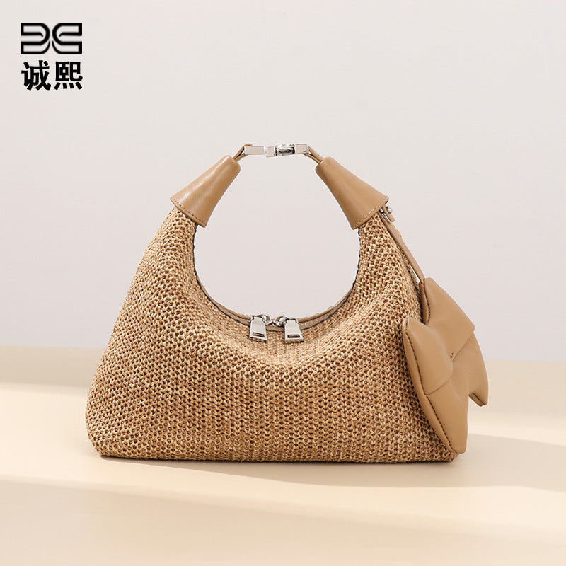 海边夏日新款拉菲草手拎饭盒包休闲百搭单肩腋下包时尚草编饺子包