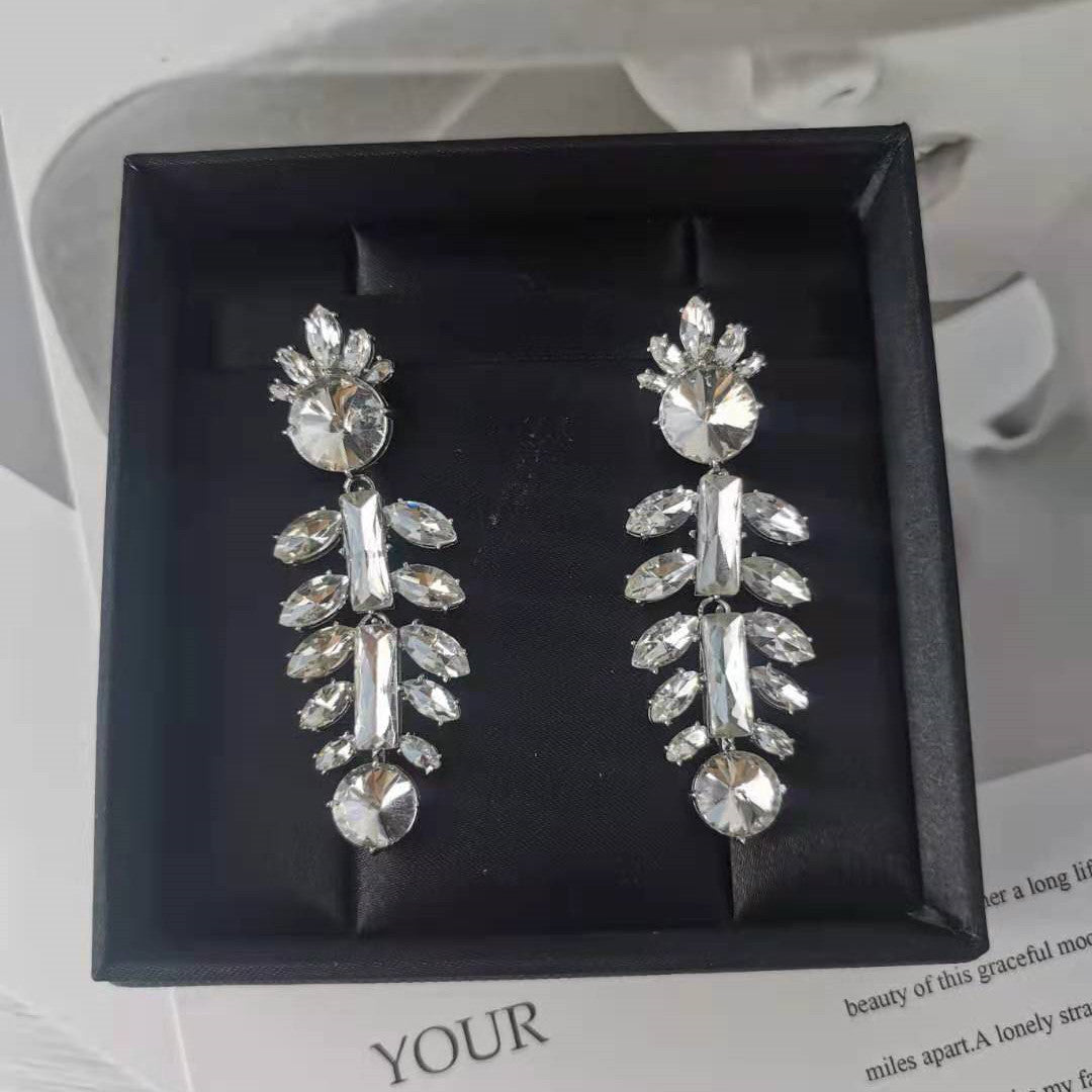 缪家新款耳环仿水晶太阳花鱼骨镶钻耳坠法式高级耳饰长款耳钉女