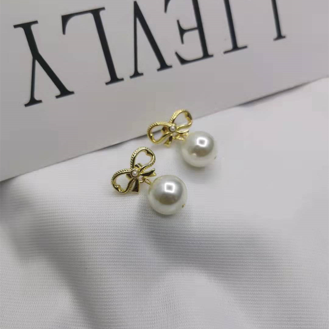 赛家21新款蝴蝶结耳钉珍珠耳坠女高级感甜美INS风几何形镀金耳环