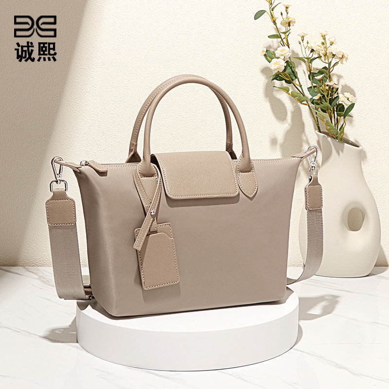 时尚新款大容量龙襄饺子包单肩斜挎包休闲潮流质感女包通勤手提包