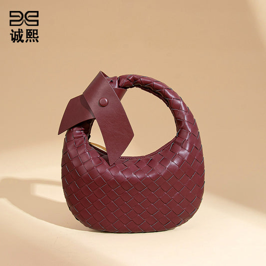 2025跨境新款手工编织牛角包时尚百搭手提女包质感休闲复古饺子包