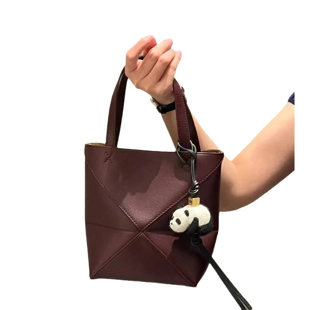 2024新款真皮女包变形几何拼接折叠托特单肩斜跨潮流双肩厂家