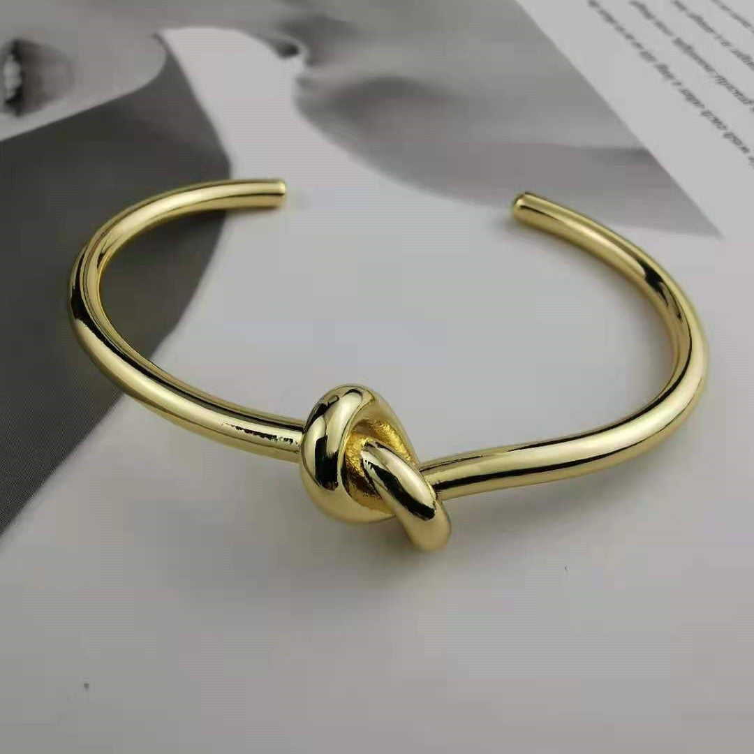 赛家新款打结手镯高级感时尚气质极简风镀金厂家批发开口光面手环