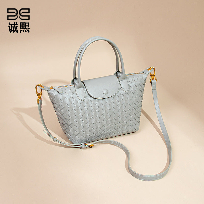 潮流新款龙襄手工编织包休闲百搭手提女包复古小众单肩斜挎饺子包