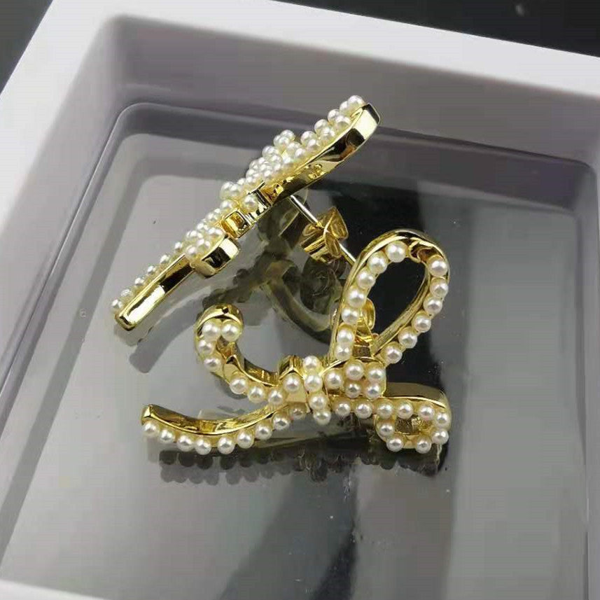 赛家新款耳钉女珍珠蝴蝶结精致INS风法式耳饰不规则蝴蝶结耳钉