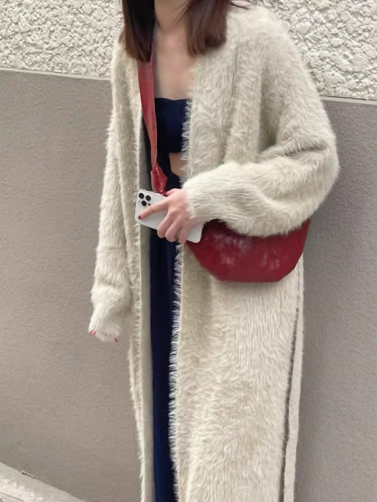 L家牛角包小众羊皮可颂包休闲饺子包真皮小号斜挎流浪胸包 批发