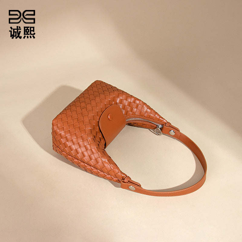 2025新款手工编织饺子包龙襄包手拎单肩女包小众百搭手提斜挎包包