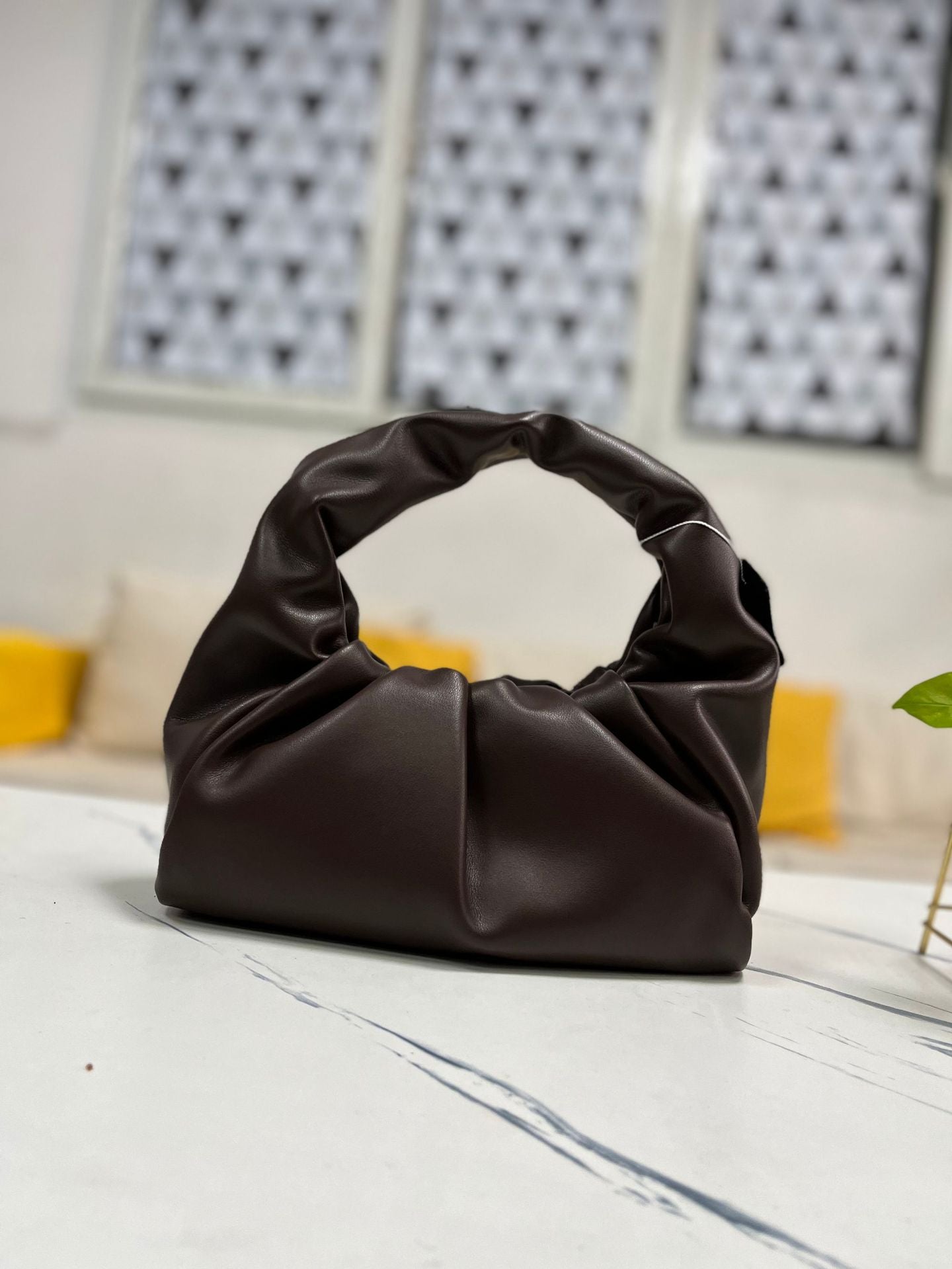 包包女2022新款女包牛角包pouch云朵包饺子包手提单肩包真皮女包