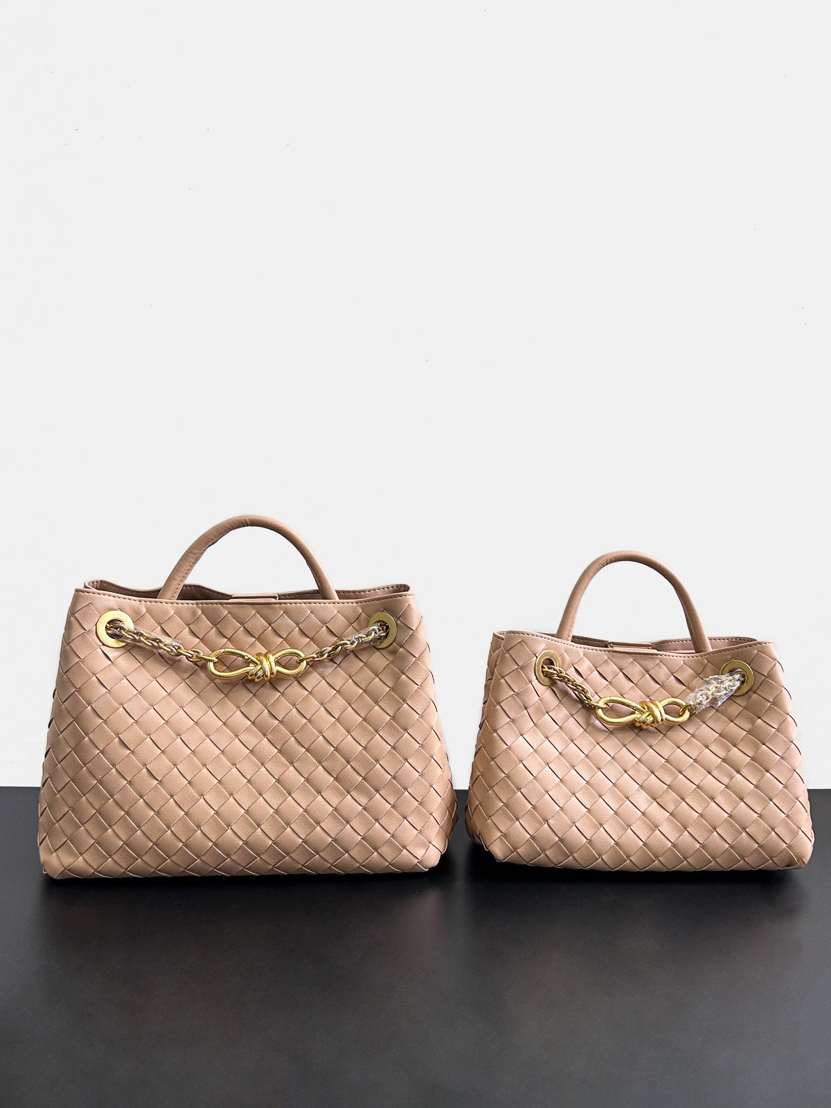 2024夏季新款编织蝴蝶结大容量真皮双肩女包单肩斜跨手提包