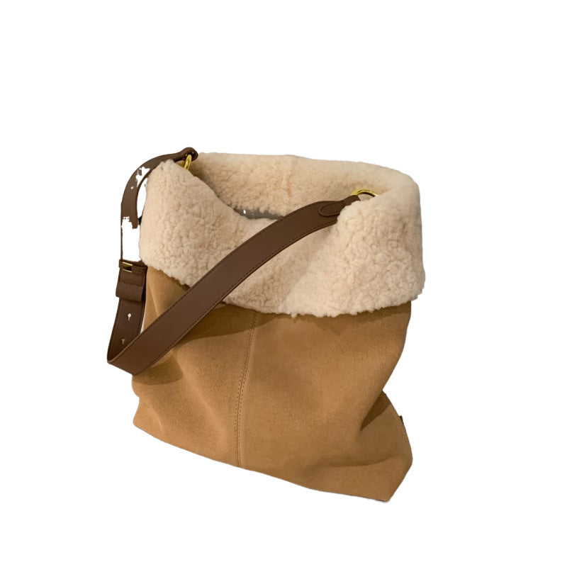 真羊羔毛水桶包包2023新款轻奢女包斜挎单肩腋下手提大容量真皮包