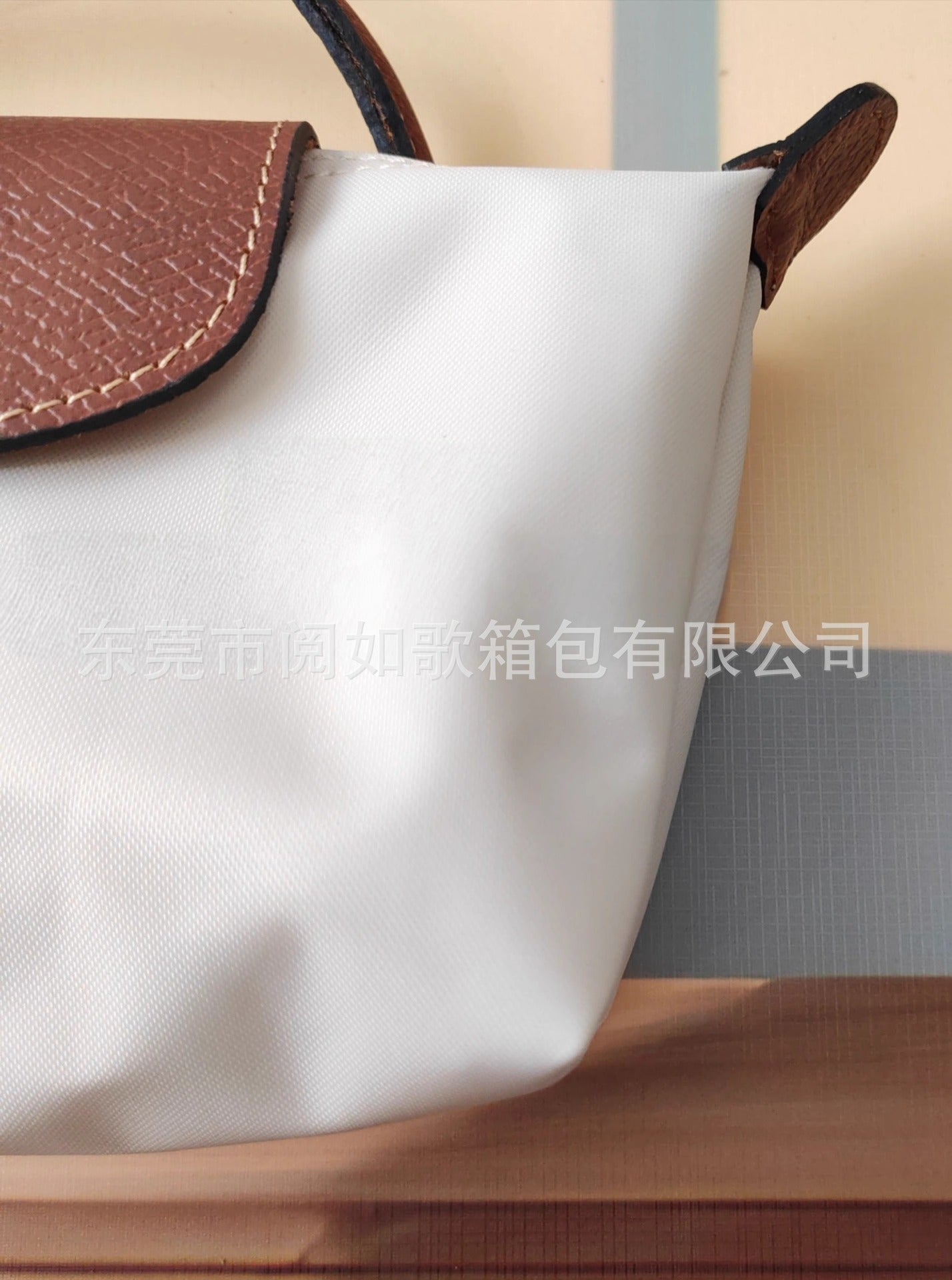 法国夏季新款mini尼龙饺子包单肩斜挎包迷你化妆包百搭手提手机包