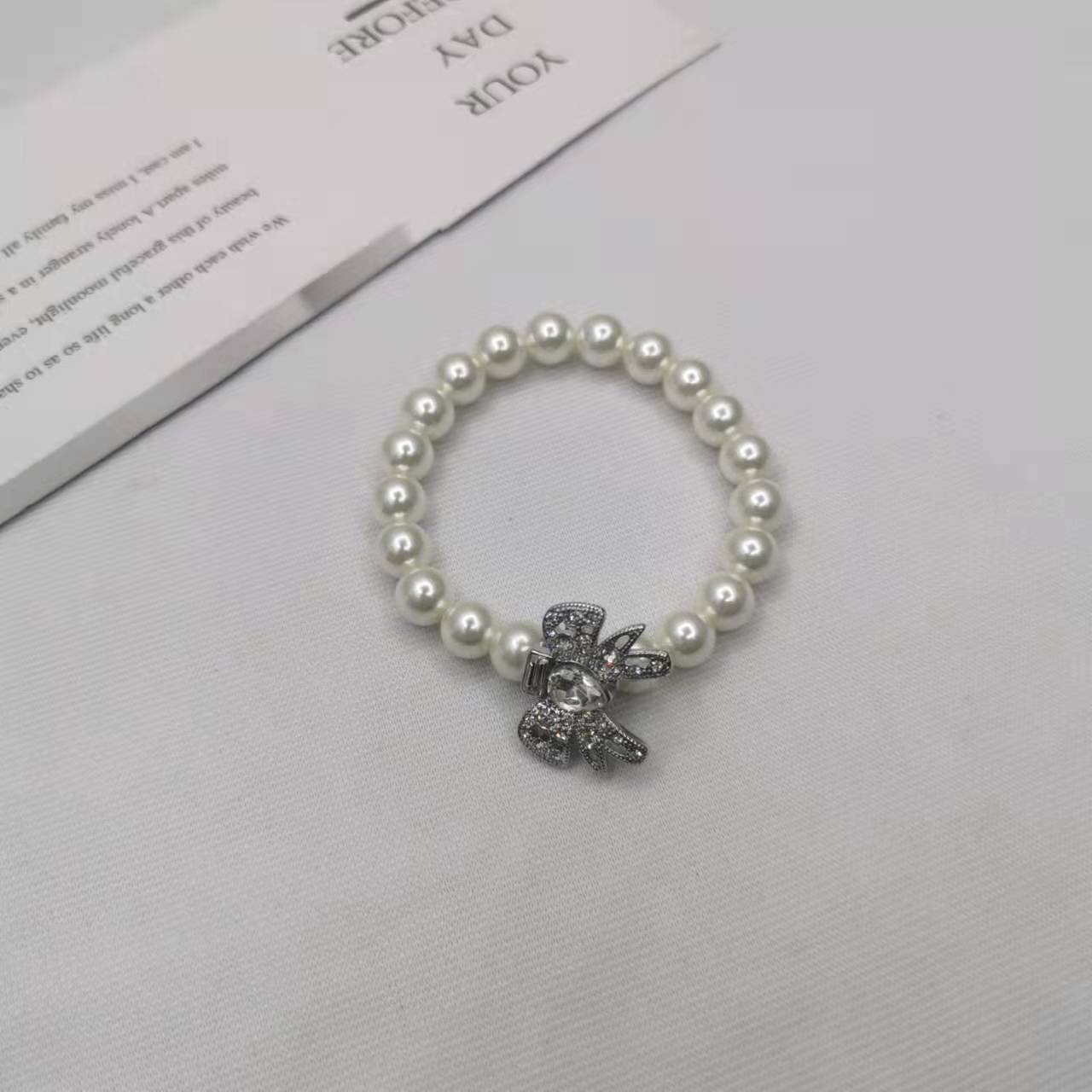 缪家21新款蝴蝶结珍珠项链女手链高级感气质INS风甜美镶钻锁骨链