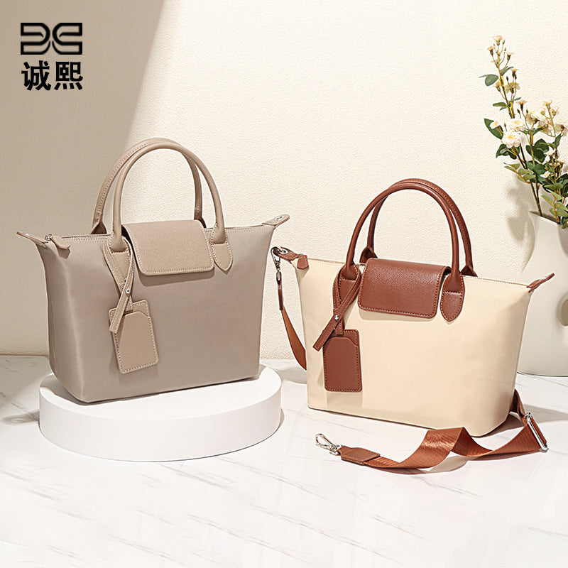 时尚大容量大号龙襄包包定制尼龙单肩斜挎女包休闲手提通勤饺子包