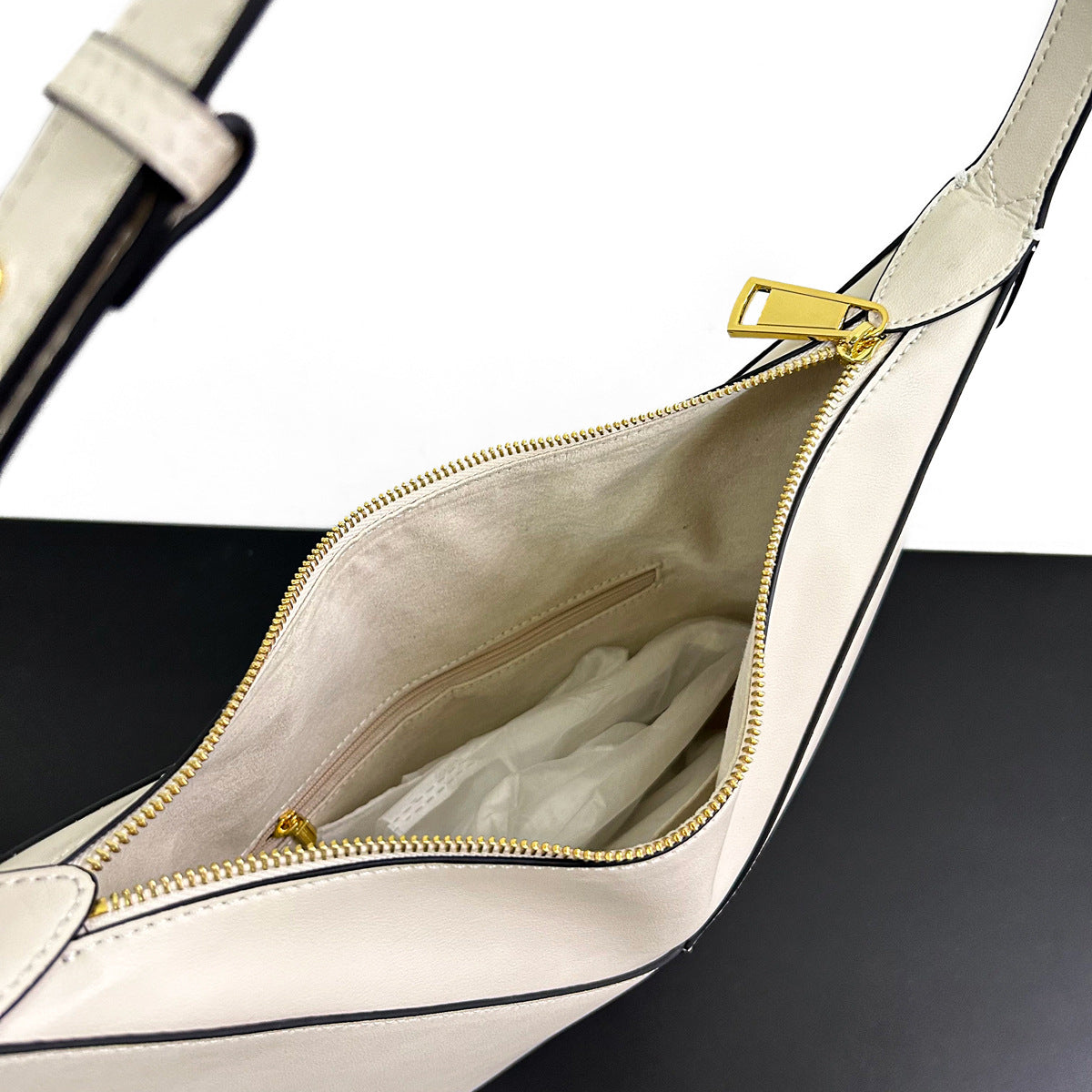 2024新款小牛皮高级感小众设计黑边手提单肩斜挎腋下包真皮吊床包