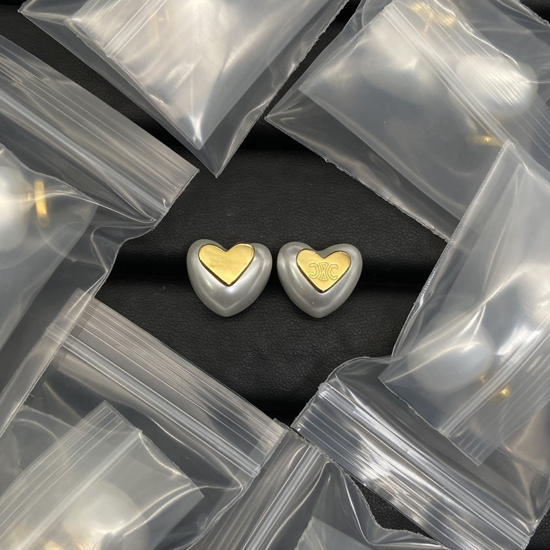 24新款凯旋门珍珠耳钉女高级感气质黄铜镀金爱心树脂耳环