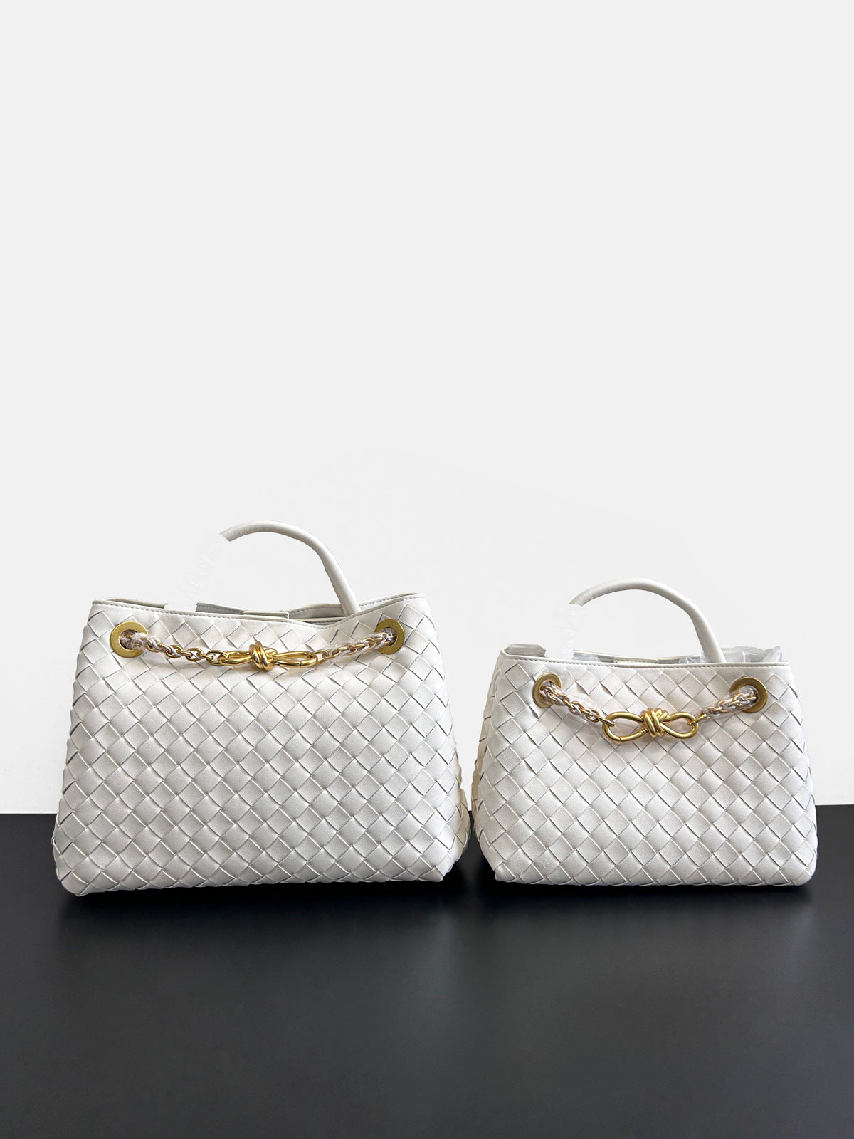 2024夏季新款编织蝴蝶结大容量真皮双肩女包单肩斜跨手提包