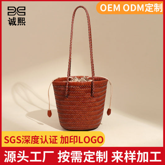 夏季新款真皮编织手提水桶包休闲菜篮沙滩包大容量单肩腋下子母包