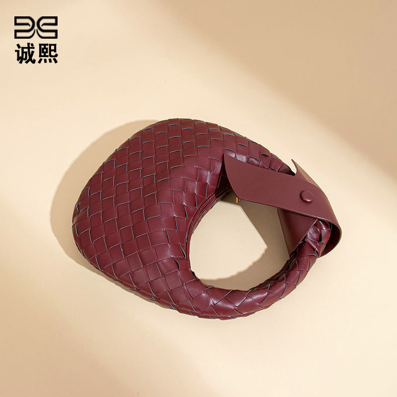 2025跨境新款手工编织牛角包时尚百搭手提女包质感休闲复古饺子包