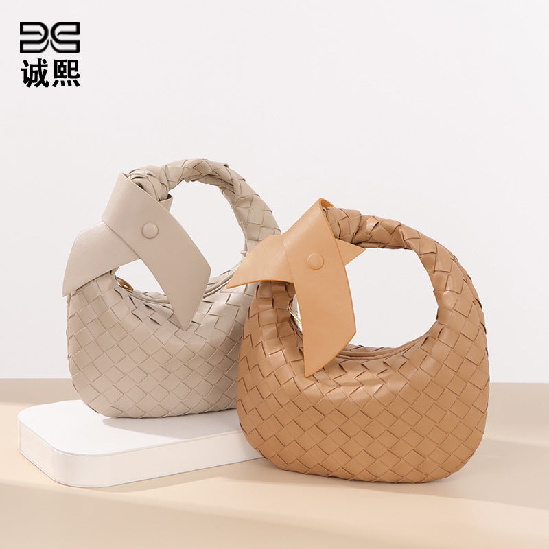 跨境潮流编织女包高级感手提百搭简约饺子包夏季休闲蝴蝶结牛角包