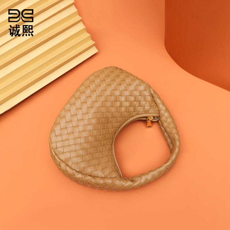 广州工厂批发编织女包定制加标手拎月牙包复古潮流手提轻便饺子包