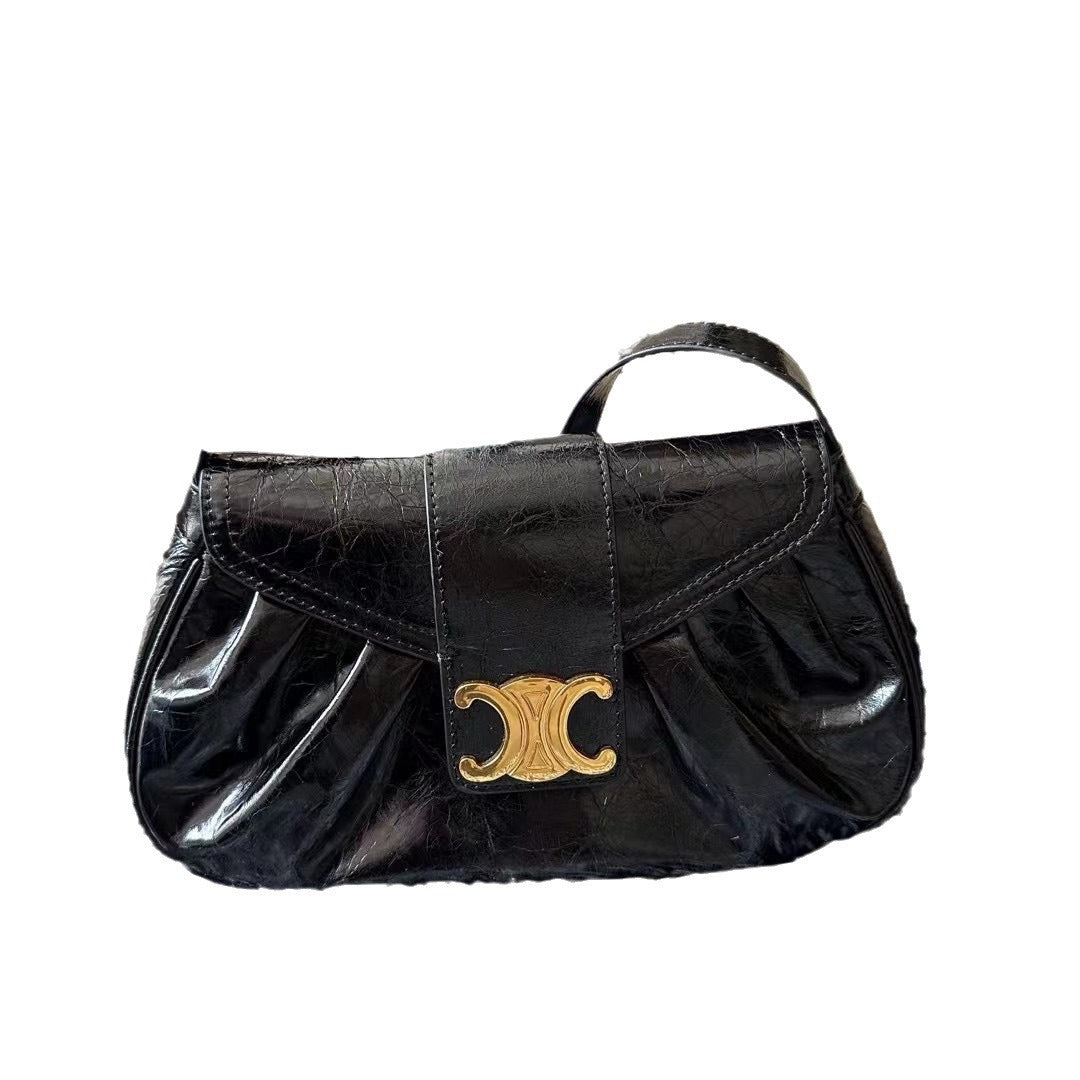 头层牛皮凯旋门真皮褶皱云朵包腋下包法棍包时尚百搭单肩手提包女