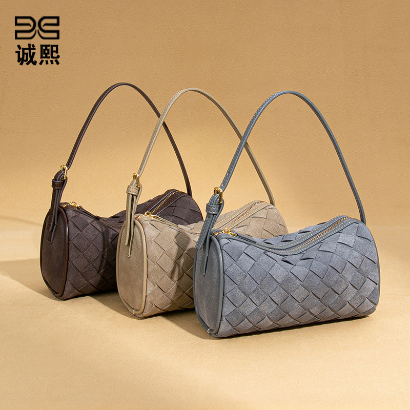 新品磨砂皮手工编织包轻奢小众单肩腋下包手提百搭潮流斜挎枕头包