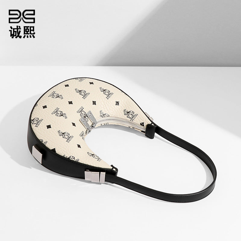 时尚潮流简约小众女单肩手提包质感流行月牙包新款兔兔兔子新月包